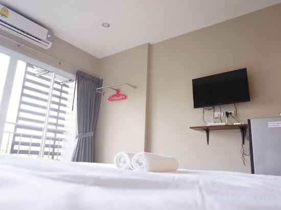 Фото Chompu Nakarin Apartment