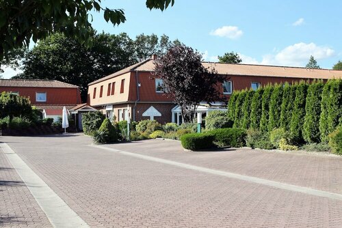 Внешний вид отеля Hotel Wittorf в Ноймюнстере, фото 2