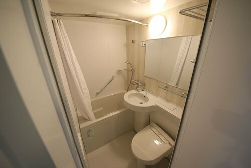 Гостиница Kuretake Inn Premium Numazu Kitaguchi Ekimae в Нумадзу