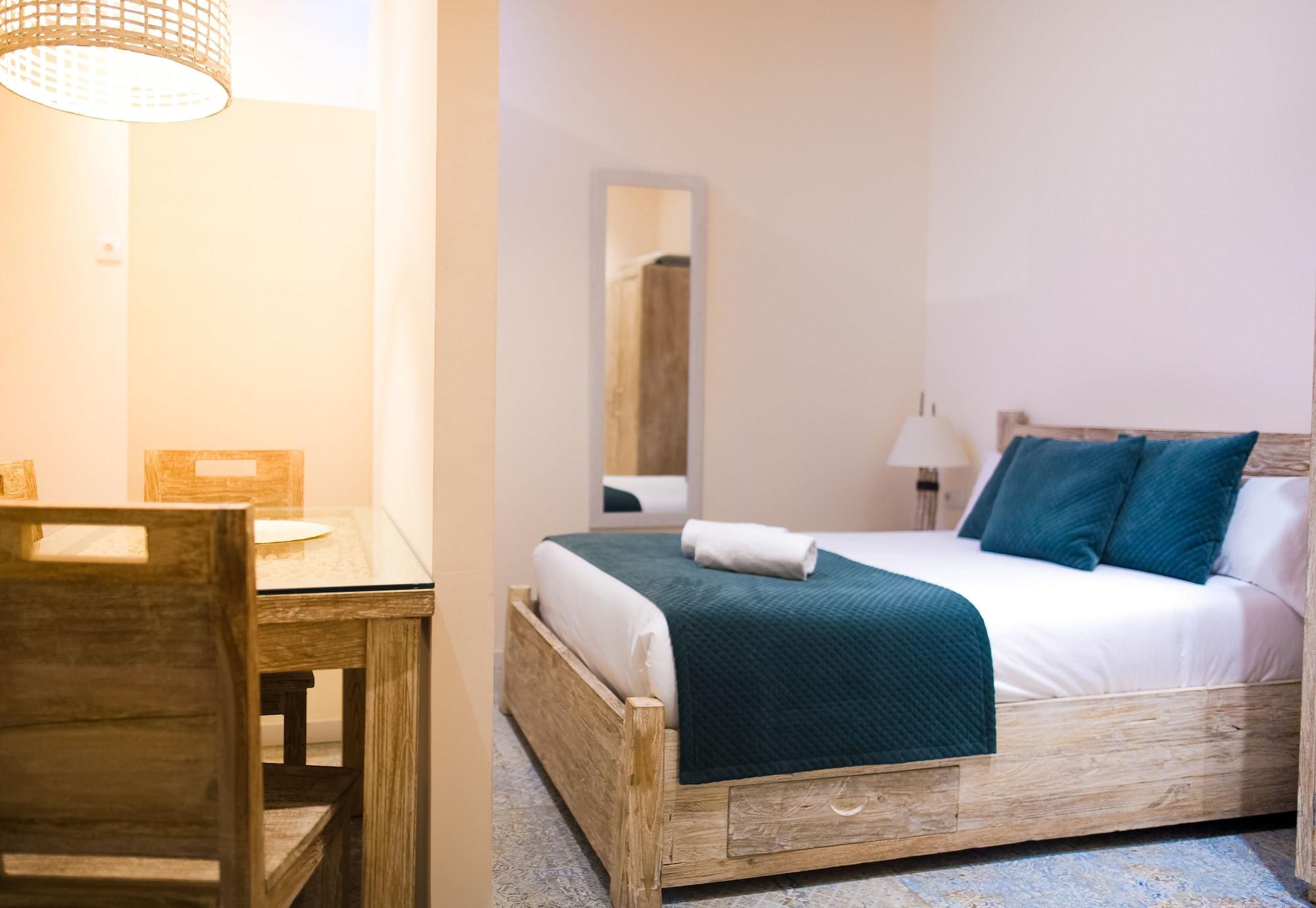 Фото La Bodega Suites