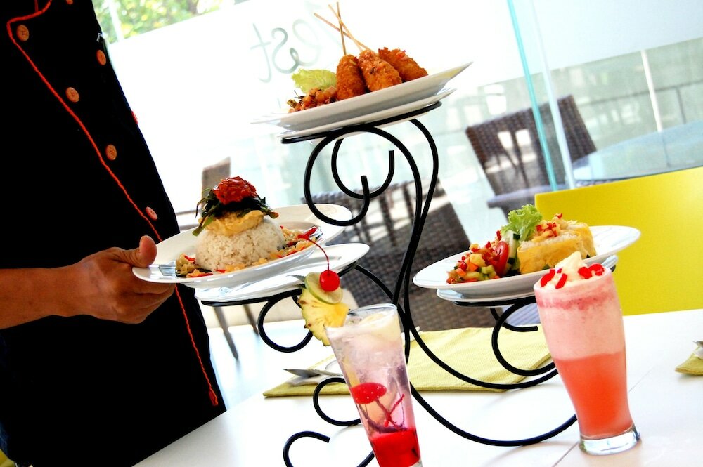 Фото Zest Jemursari by Swiss-Belhotel International