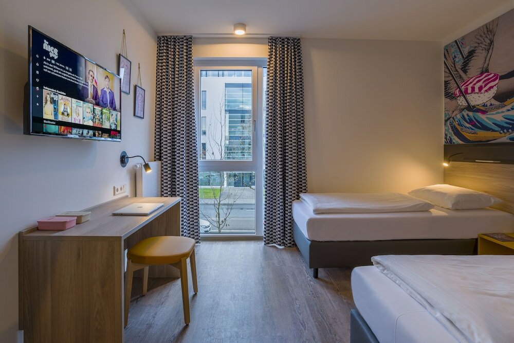 Фото Ramada Encore by Wyddham Munich Messe