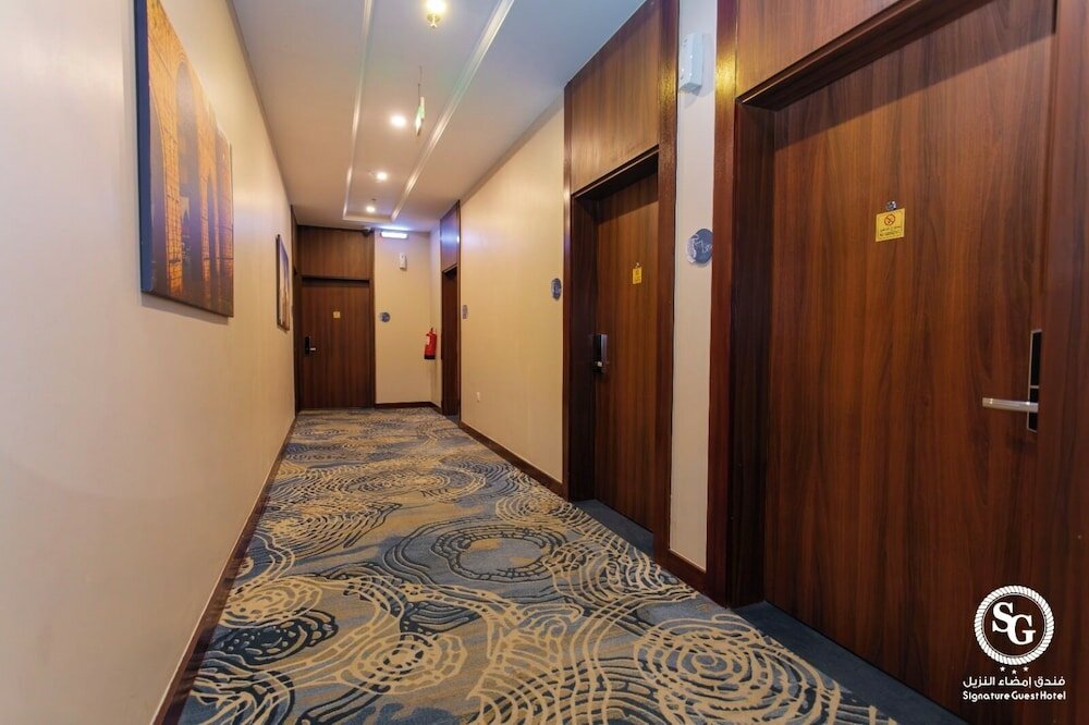 Фото Signature Guest Hotel