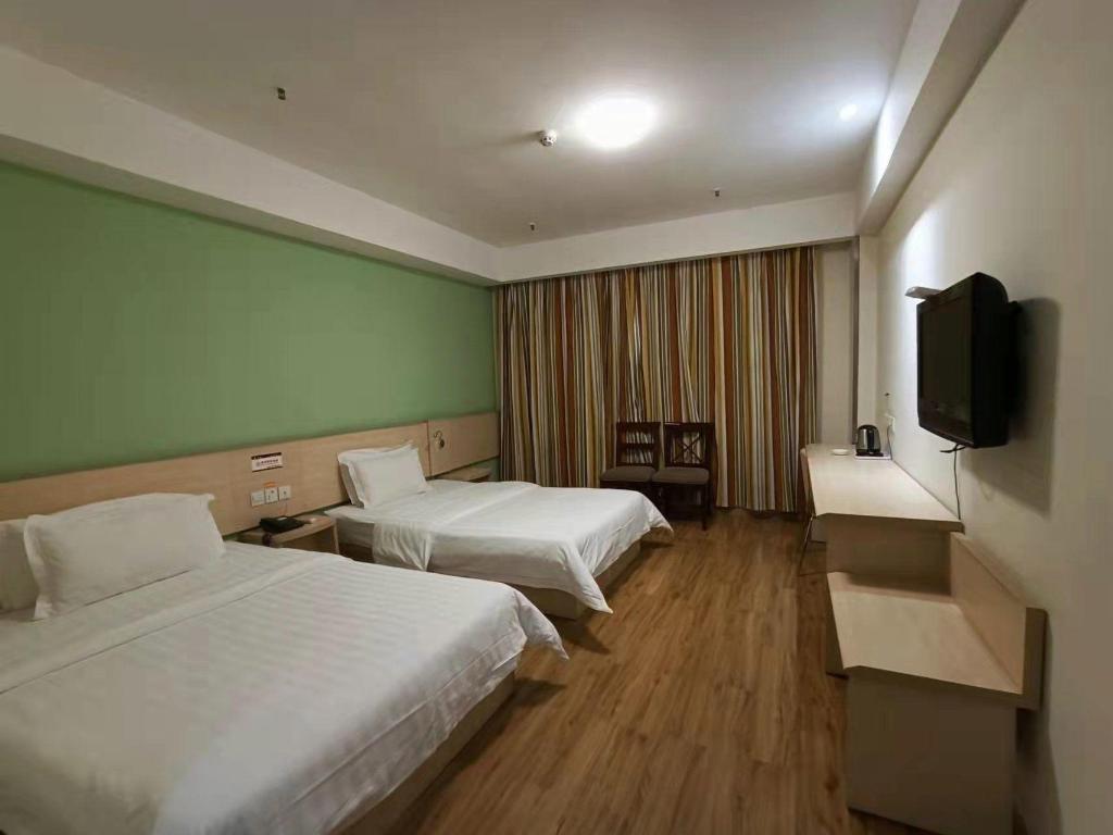 Фото 7Days Inn Chain Hotel Chongqing Wanzhou Gaosuntang Chongbai