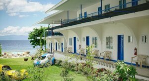 Гостиница Pescadores Suites Moalboal