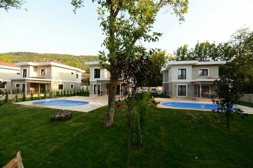 Гостиница Guzel Evler Family Resort в Картепе