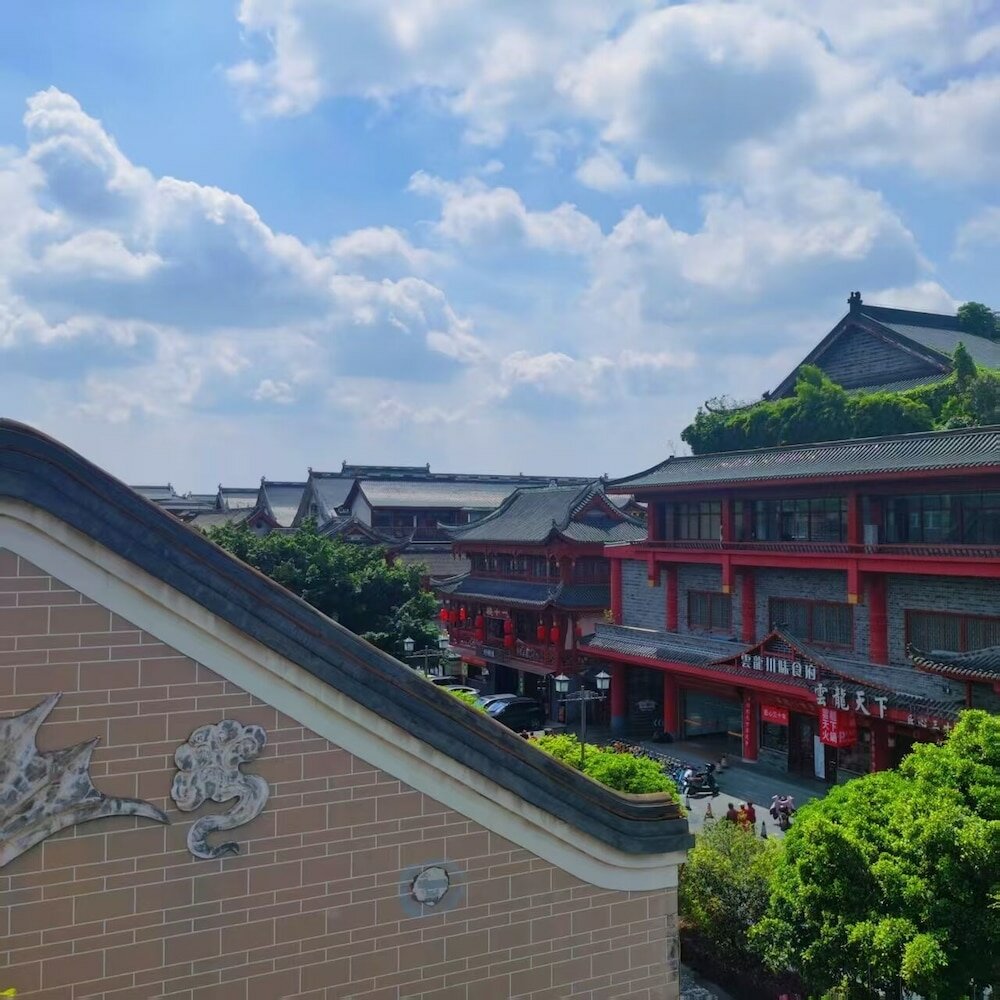 Фото Chengdu Wenjun courtyard Hotel