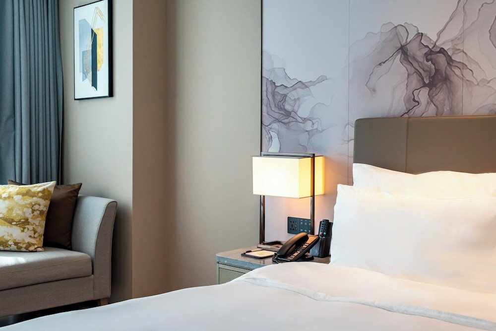 Фото Ln Dongfang Hotel Pazhou