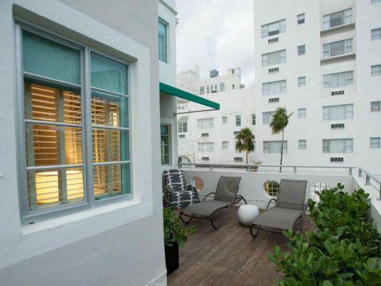 Фото Kimpton Surfcomber Hotel, an Ihg Hotel