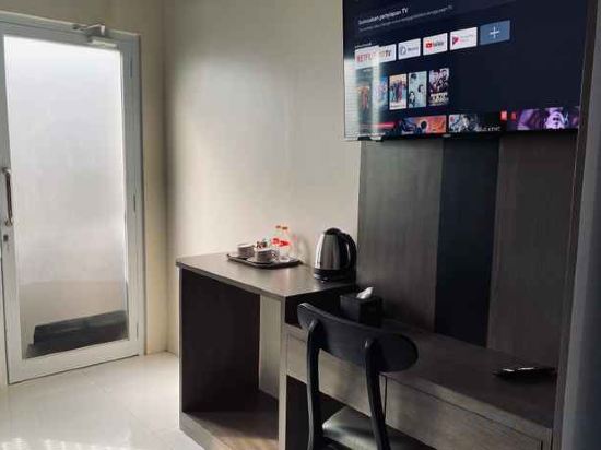 Фото Genio Syariah Hotel Solo