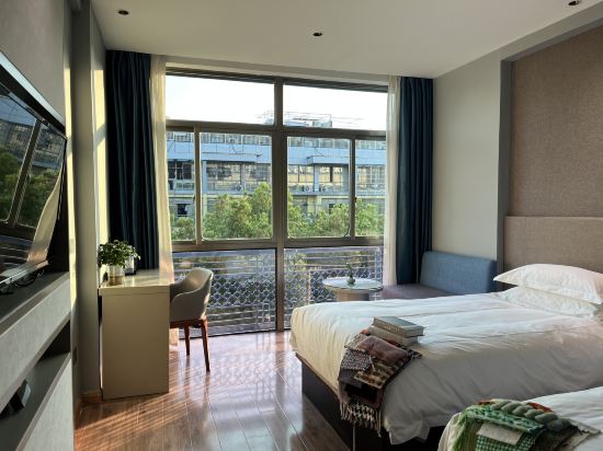 Фото Yiwu Manting City Hotel