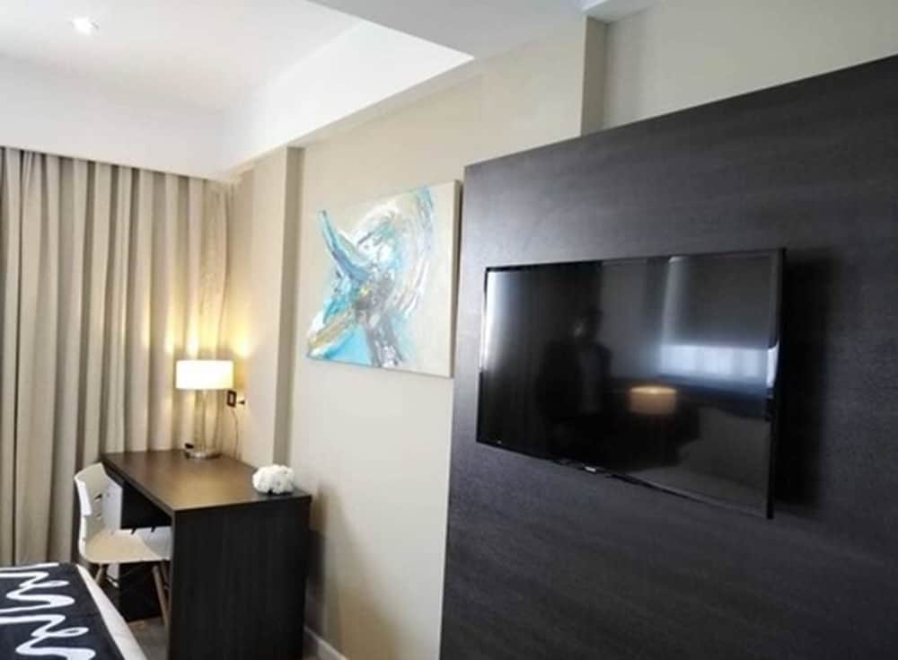 Фото Amerian Rafaela Hotel