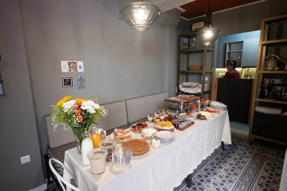 Фото Athenian Yard Suites