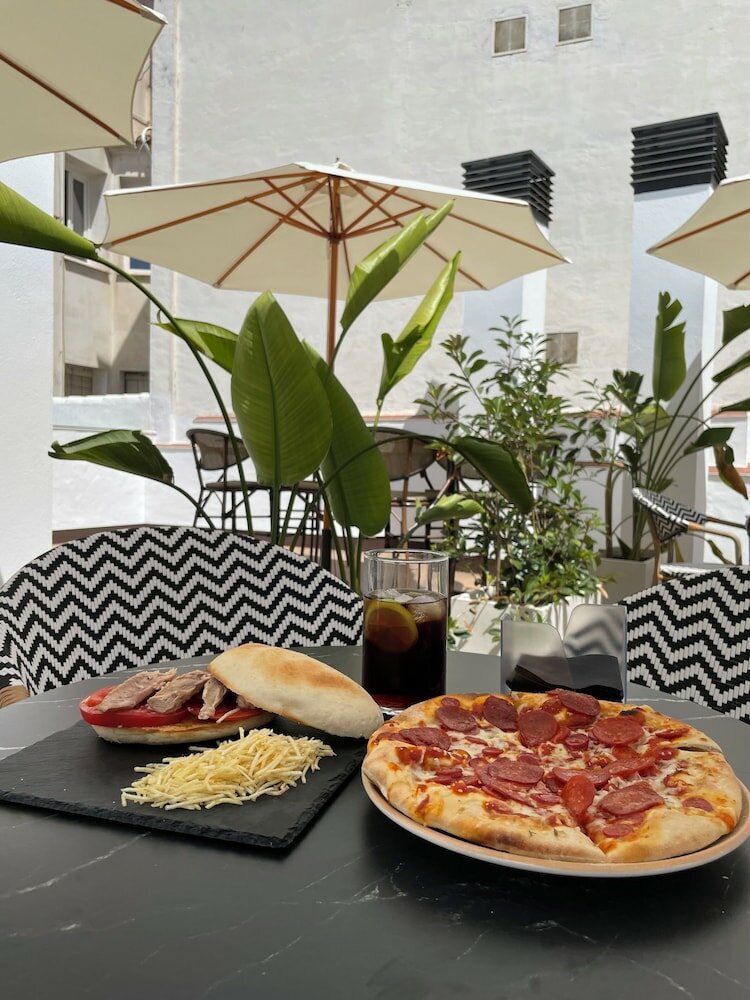 Фото Hotel La Boutique Puerta Osario