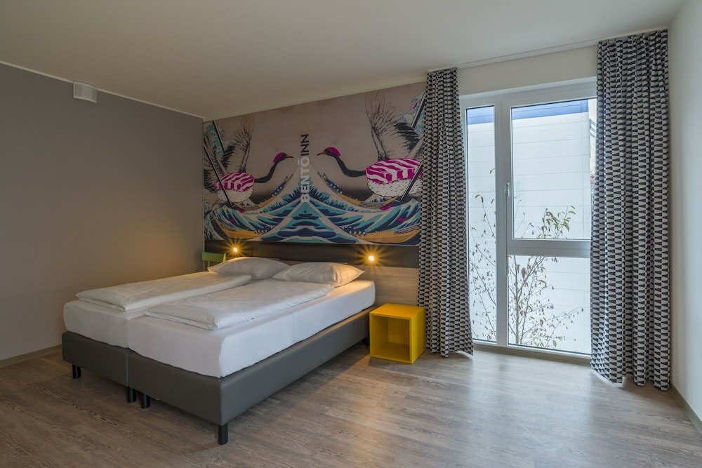 Фото Ramada Encore by Wyddham Munich Messe