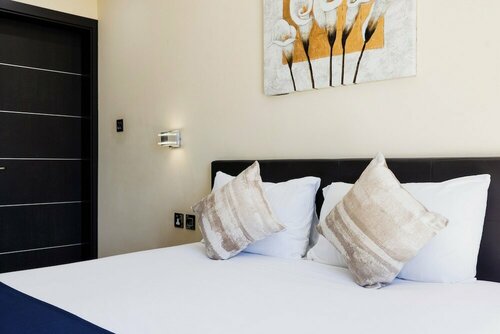 Внешний вид отеля Porto Azzurro Aparthotel в Сент-Полс-Бэйе, фото 5