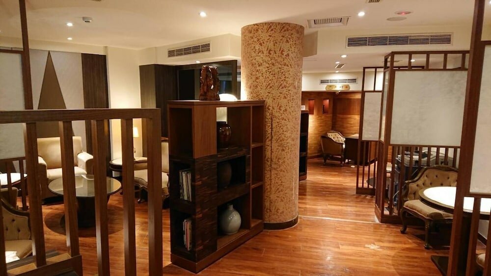 Фото Deja Vu Hotel