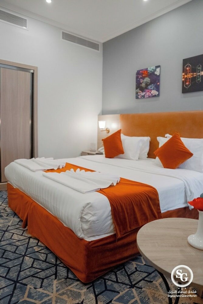 Фото Signature Guest Hotel