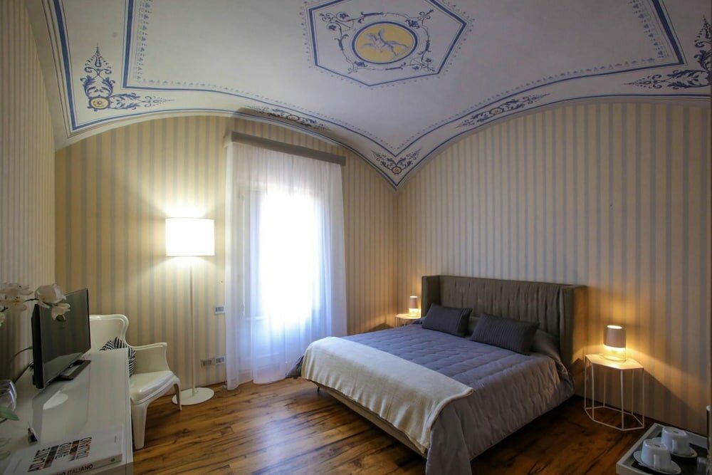 Фото B&b Le Logge Luxury Rooms