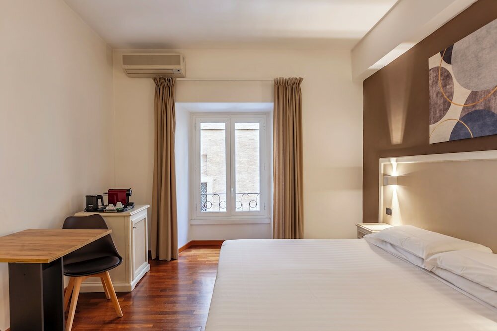 Фото Inn Rome Rooms & Suites