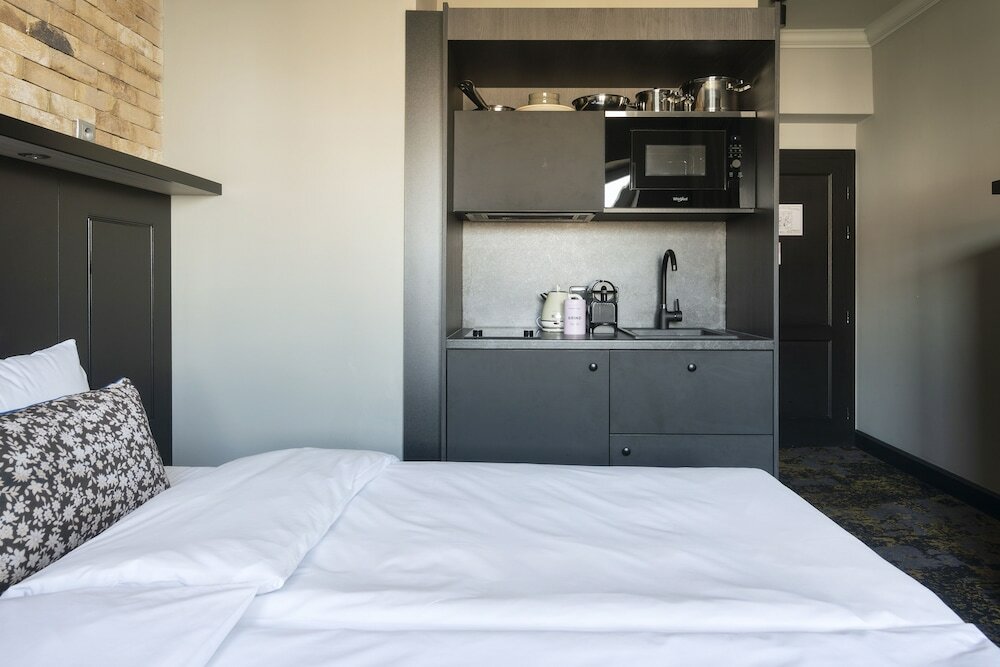 Фото Numa Root Rooms & Apartments