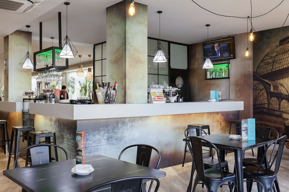 Фото Hotel Puerta de Toledo