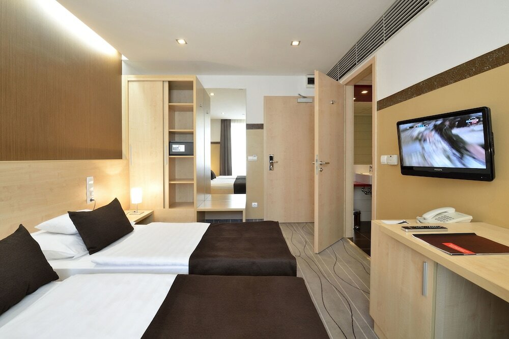 Фото Promenade City Hotel