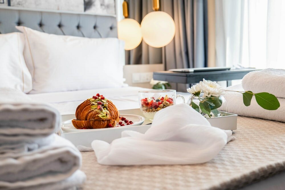 Фото Gate Twenty Two Boutique Hotel