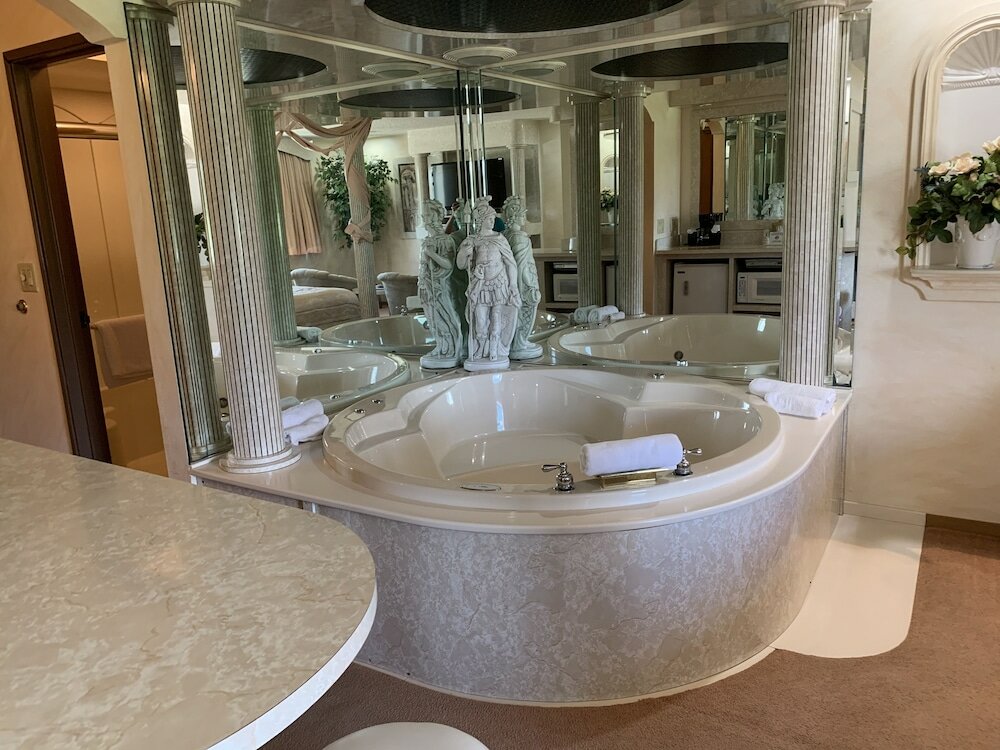 Фото Designer Inn & Suites