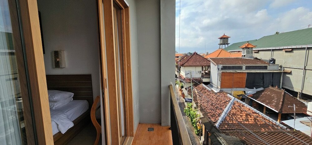 Фото Satriya Cottages