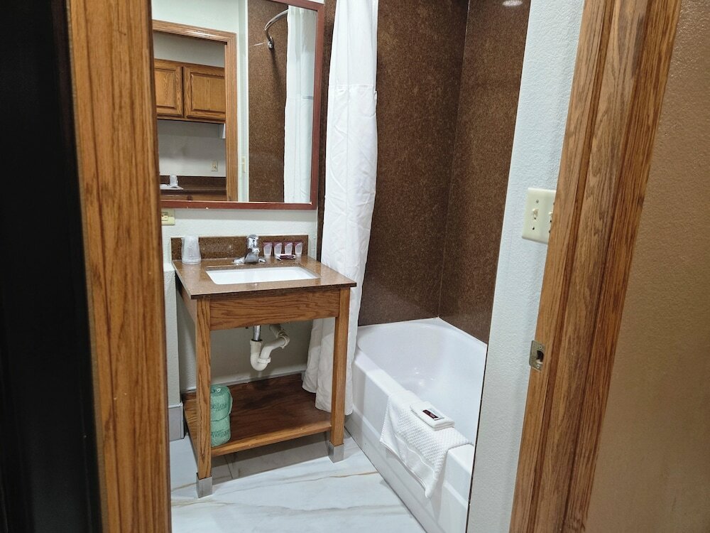 Фото Town House Extended Stay Hotel Downtown