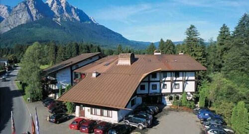 Внешний вид отеля Hotel Quellenhof в Грейнау, фото 1