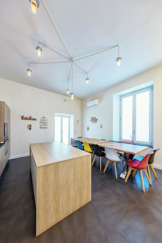 Фото Napoli Squares Suites