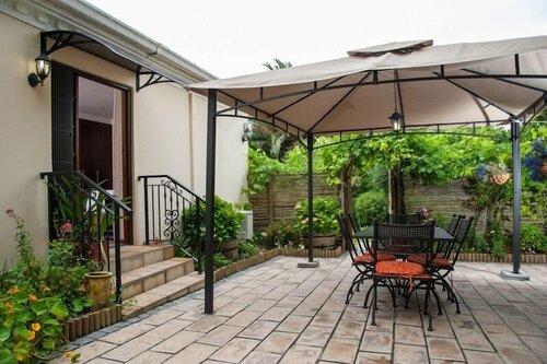 Внешний вид отеля Blaauwheim Guest House в Сомерсет-Уэсте, фото 4