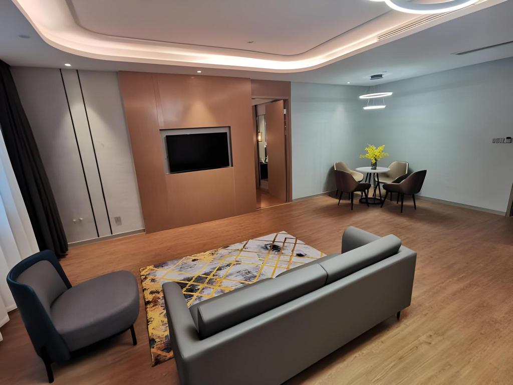 Фото Magnotel Jining Jiaxiang, Zengzi Avenue Hotel