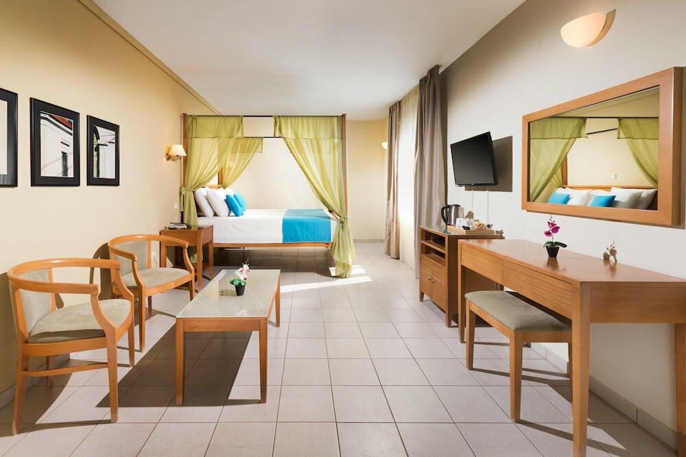 Фото Aeolian Village Beach Resort