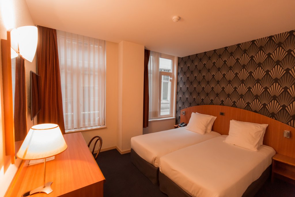 Фото Aris Grand-Place Hotel