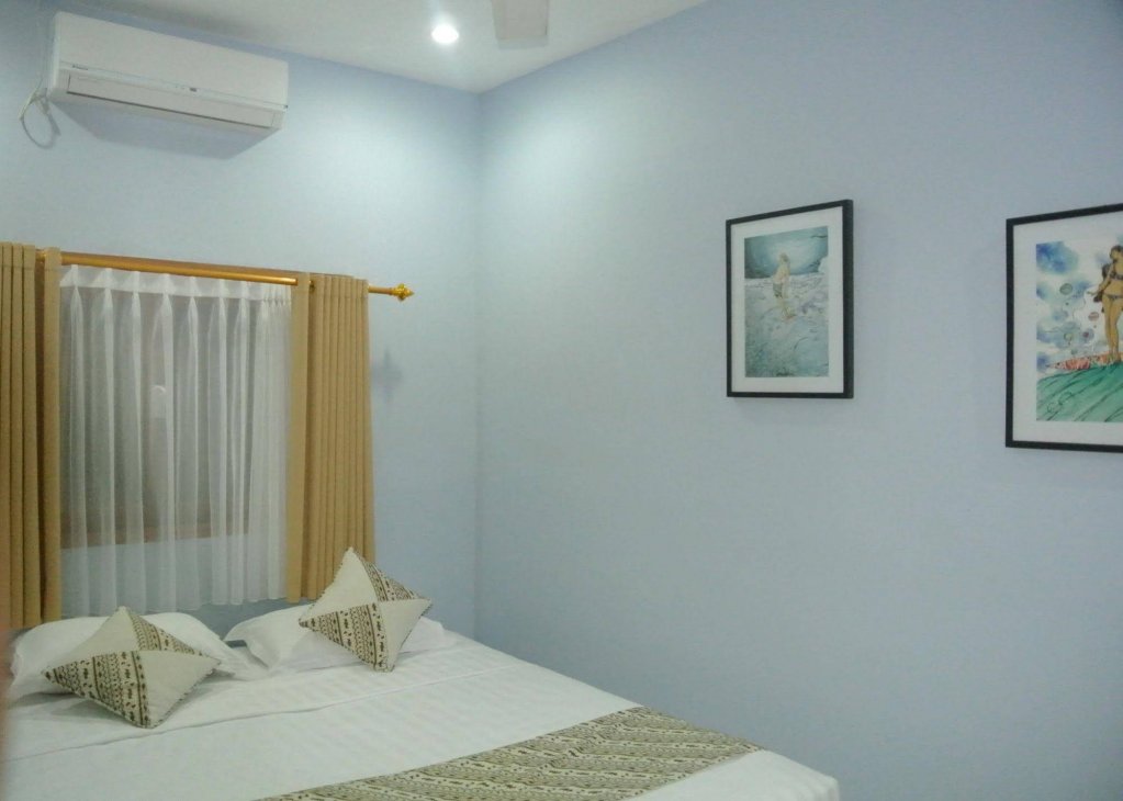 Фото Andy's Surf Villa & Bungalows