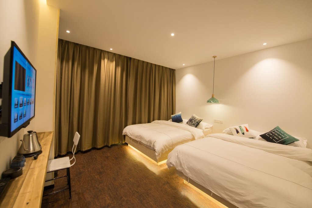 Фото Xiamen Feisu Tianchunshe Holiday Villa