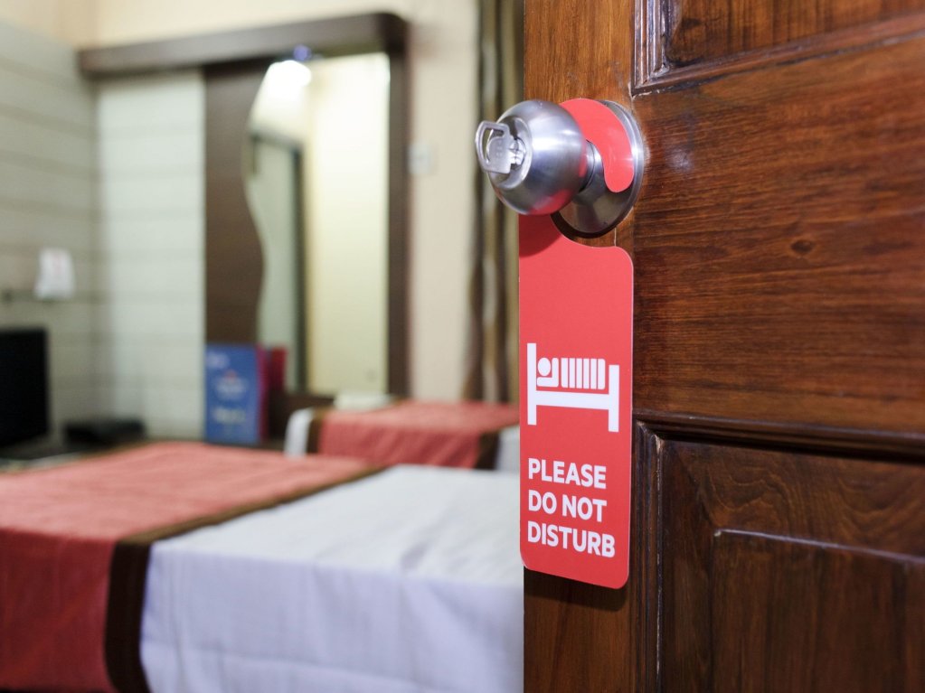 Фото Oyo 6606 Seacom Inn Purbadiganta