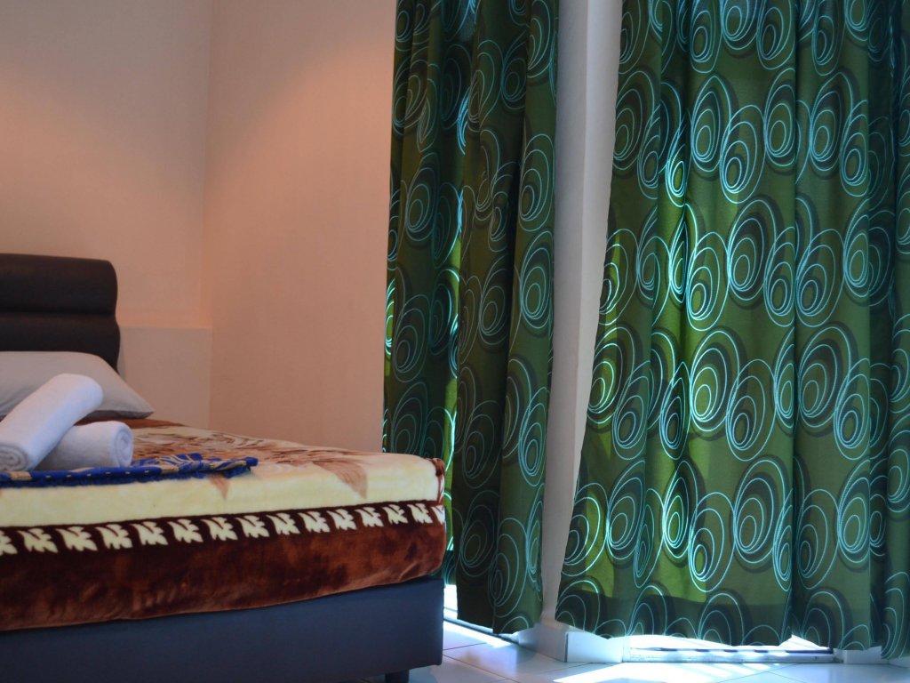 Фото Oyo 774 Hotel Iskandar