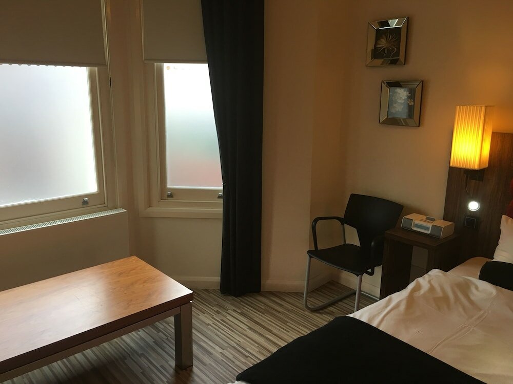 Фото Simply Rooms & Suites