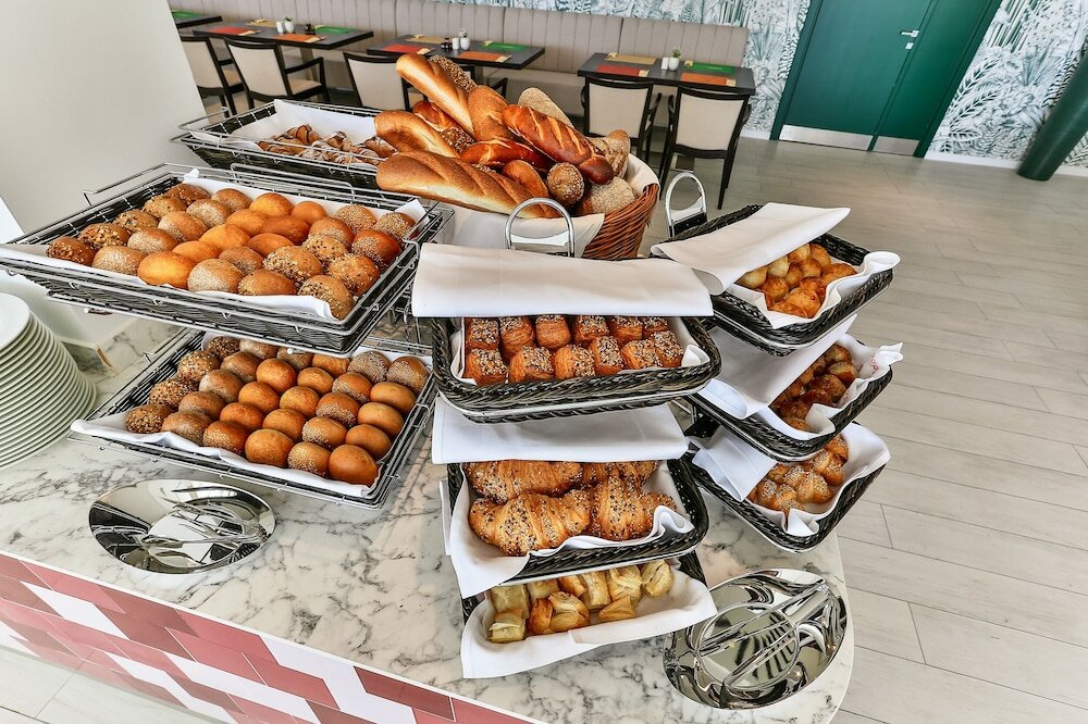 Фото Hotel Tq Plaza