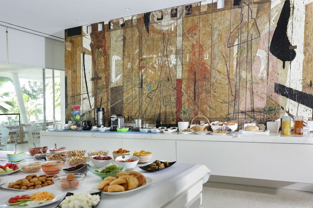 Фото Mykonos Dove Beachfront Hotel