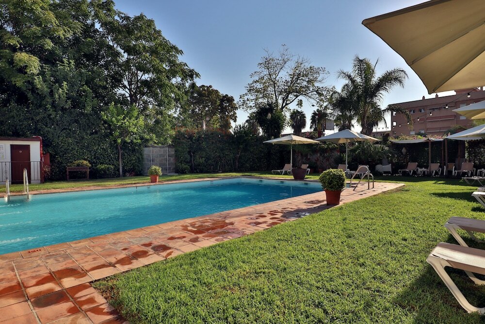 Фото Oasis Cordoba Hotel