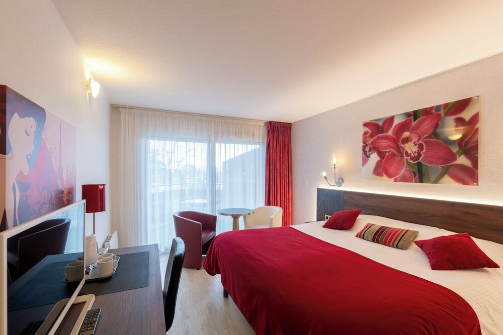 Фото Logis Hôtel l'Arc en Ciel