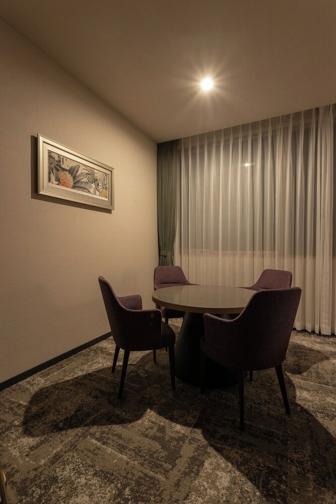 Фото Amami Sunplaza Hotel