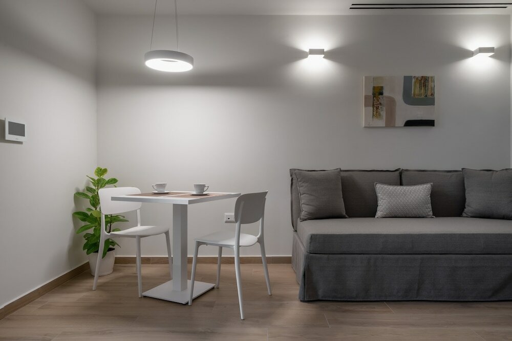 Фото Athens Hill Luxury Apartments