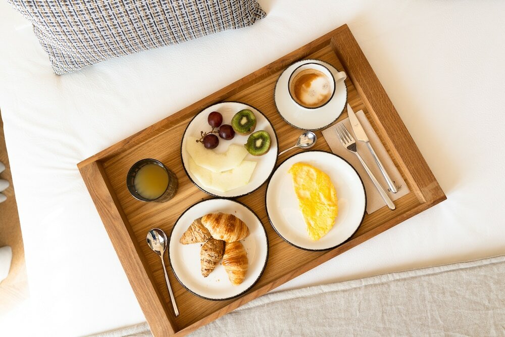 Фото Boutique Hotel Petit Montisión