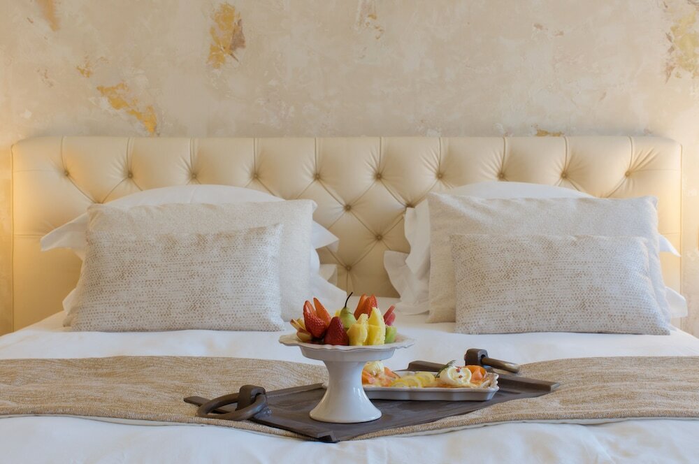 Фото Castellano Hotel & Suites